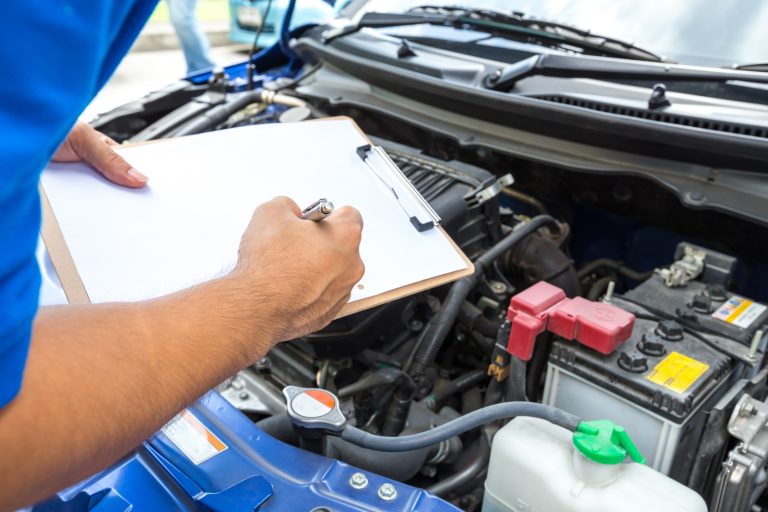 Mechanic checking a car