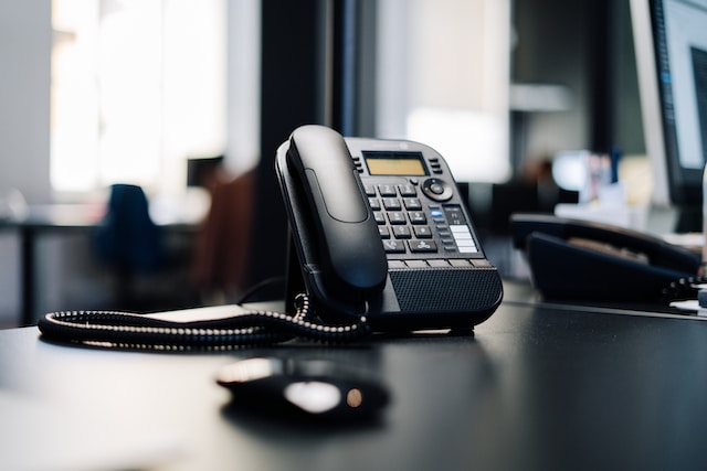 an office phone on a desk